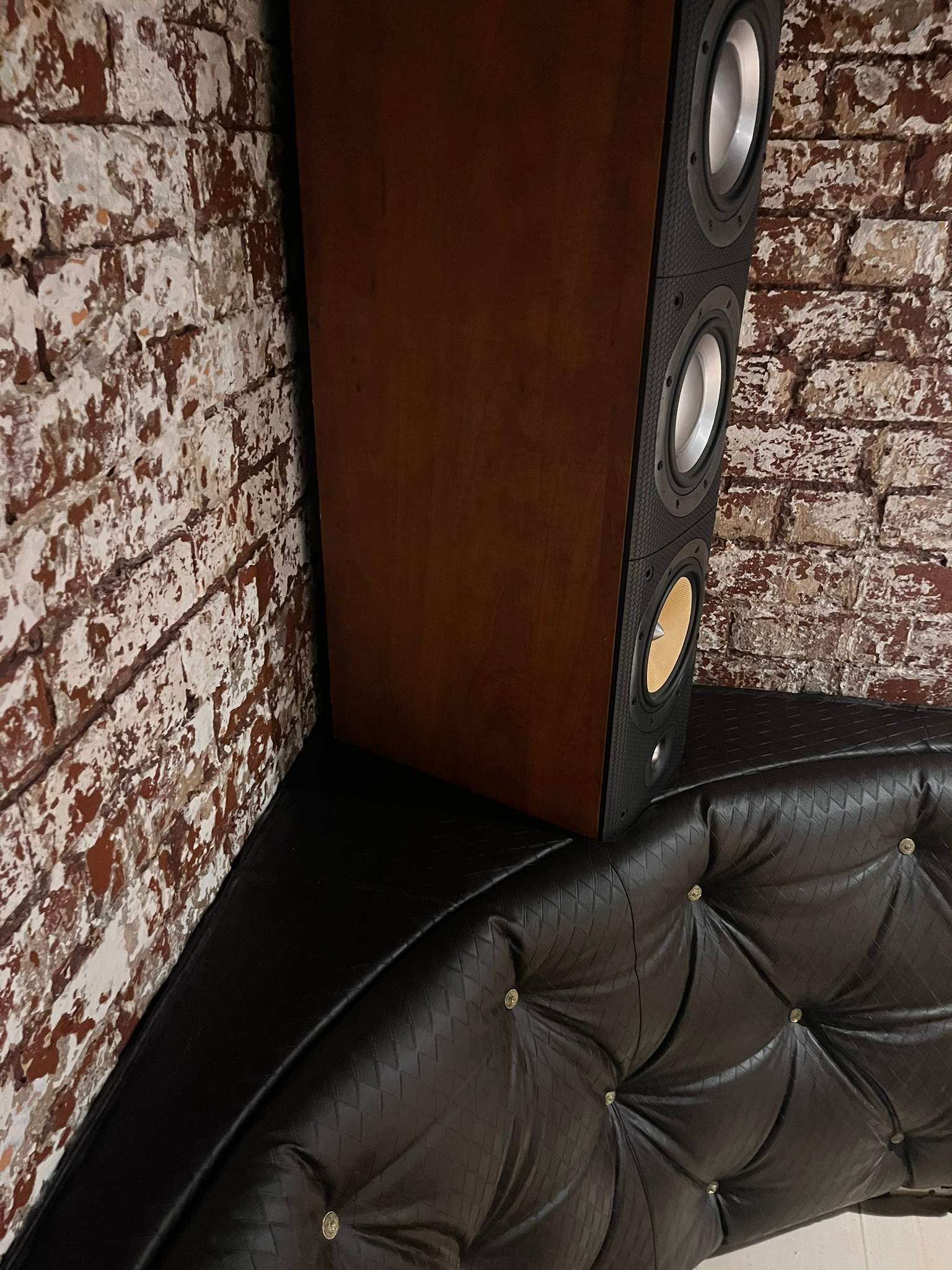 Premium speakers positioned in a listening and entertainment space