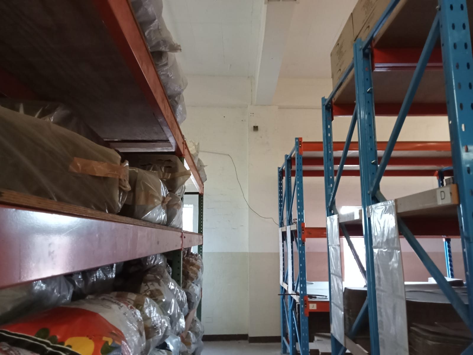 Warehouse CCTV camera view used for operational camera naming and sign-off