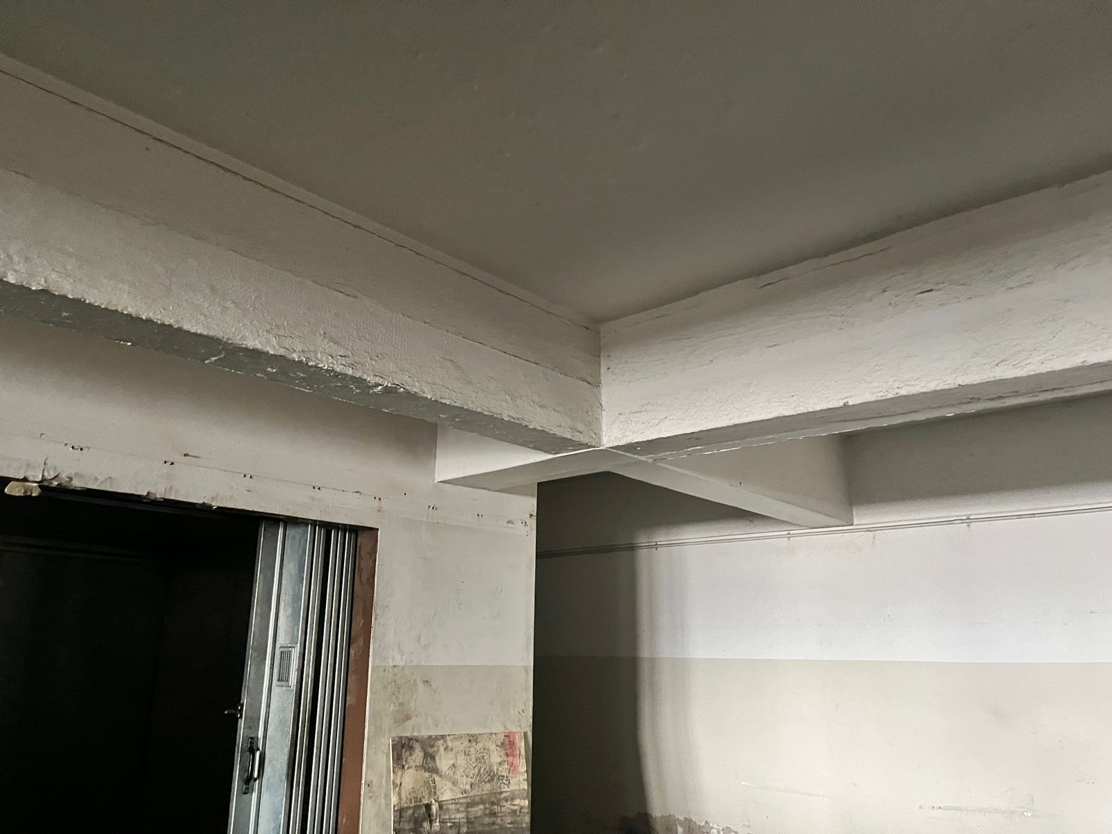 Commercial CCTV cable route being planned around concrete beams
