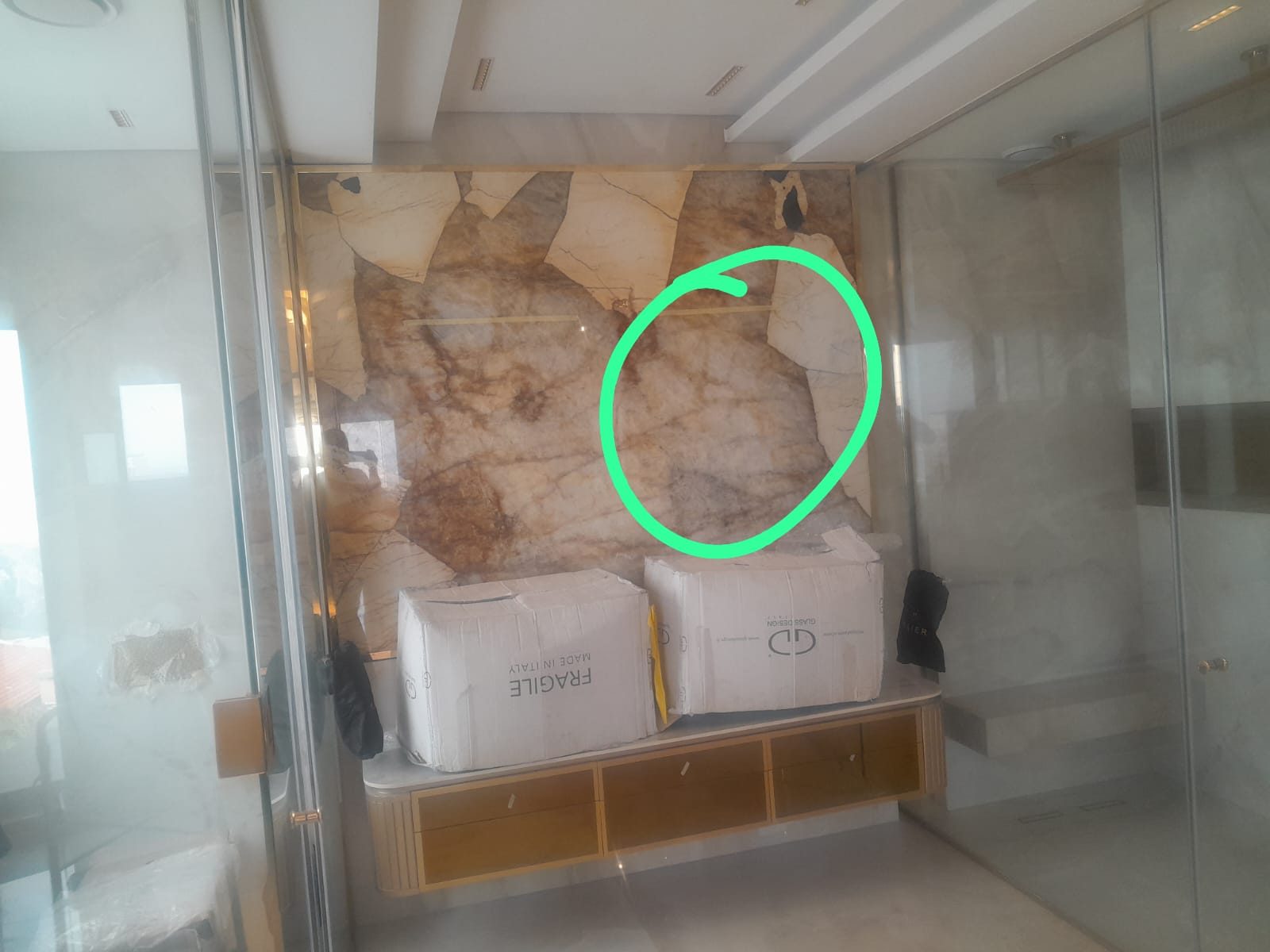 noniti job (mulla) installing lights behind marble